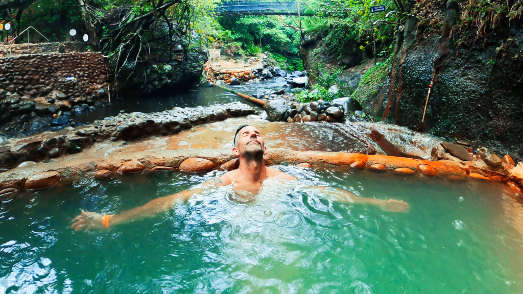 Man relaxing in hot springs