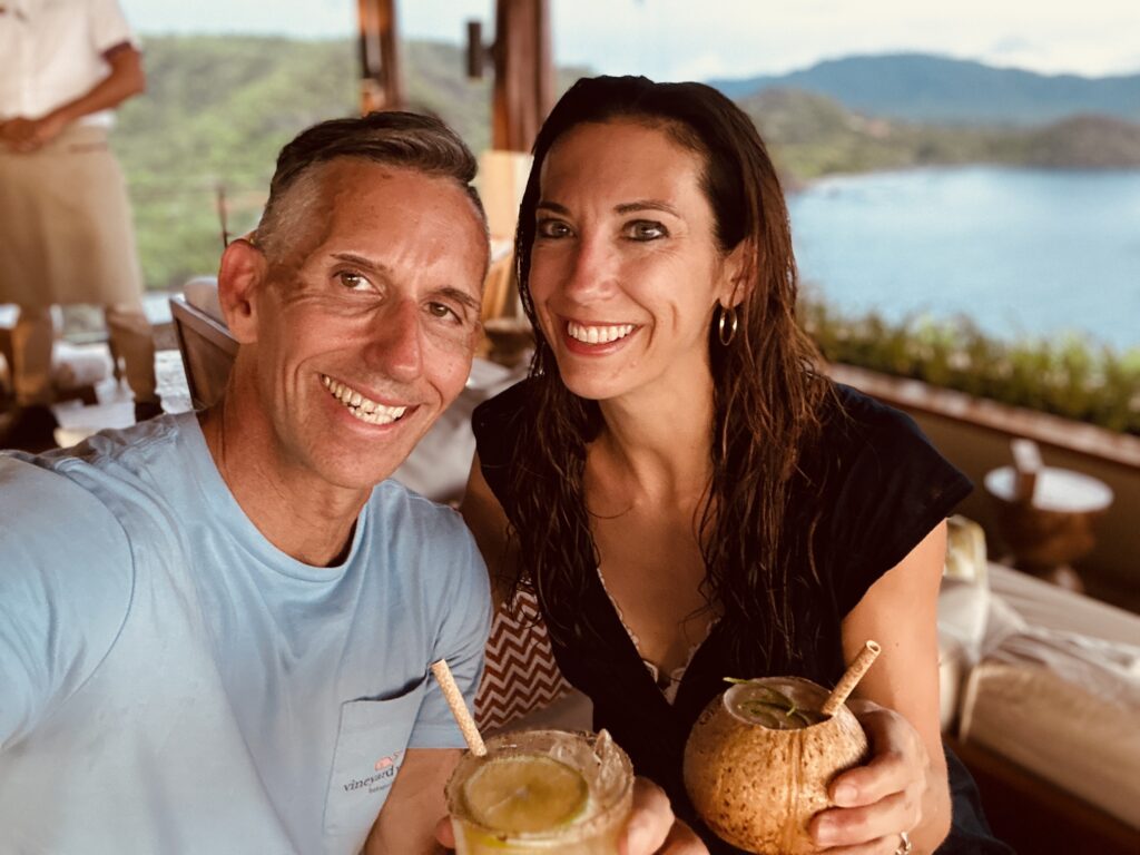 Couple with drinks at restaurant