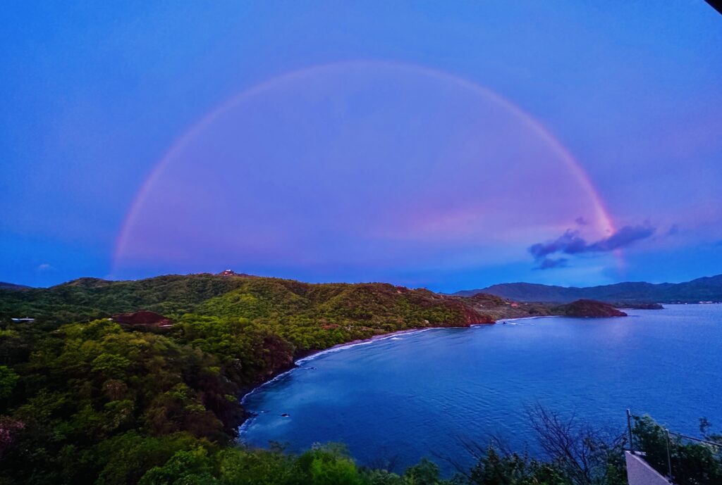 Rainbow over ocean