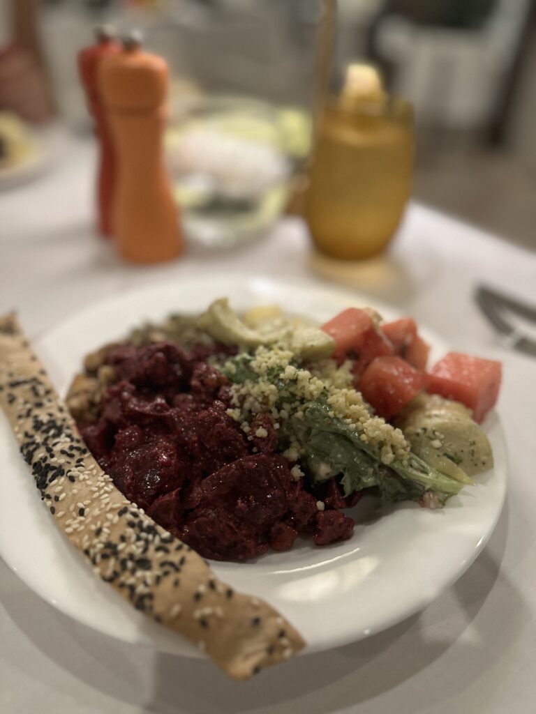 Breadstick, beets, salad, quinoa, melon, artichoke