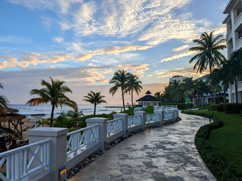 Path by the ocean at sunset