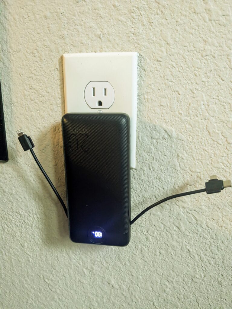 Power Bank with Cords plugged into wall