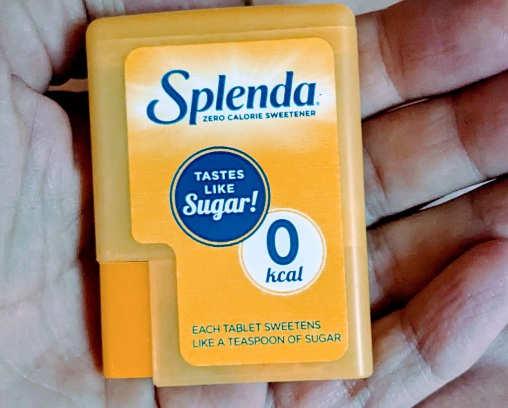 Splenda dispenser in hand